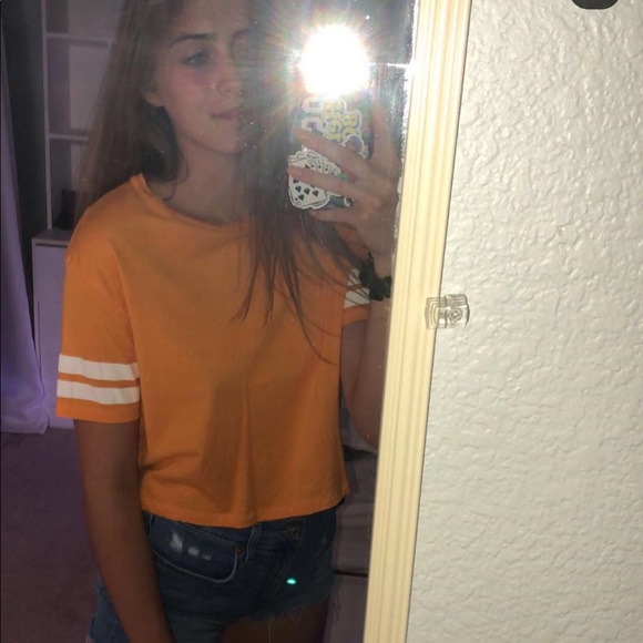 yellow t-shirt with white stripes on the sleeves - Picture 2 of 3